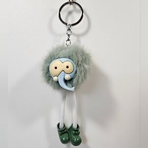 Green Elephant Puff Keychain – Soft Fuzzy Charm with Little Shoes